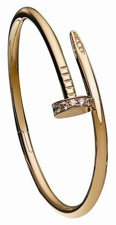 a gold bracelet with diamonds on it