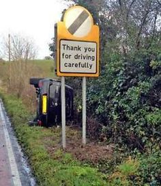 a sign that says thank you for driving carefully