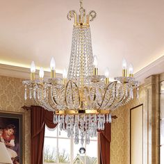 a chandelier hanging from the ceiling in a living room