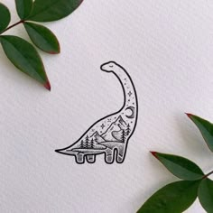 a drawing of a dinosaur with trees and mountains in the background on white paper next to green leaves