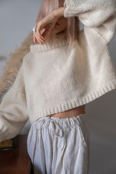 "Cute chunky crop sweater with long balloon sleeves. Made from organic undyed pure wool. Materials: wool Measurements of size S/M: Length: 40 cm (+ 5cm neck) Chest: 130 cm Measurements of size L/XL Length: 45 cm (+5 cm neck) Chest: 147 cm Measures of Model in the photo Size: S Chest: 33\" - 83 cm Waist: 24\" - 62 сm Hip: 35\" - 88 cm Height: 5′ 6″ CARE INSTRUCTIONS: DRY CLEAN is the best way. HAND WASH. Make sure to use cold water and neutral soap. The less you touch and agitate them, the better Cropped Wool Sweater, Crop Pullover, Daily Outfit Inspiration, Boxy Sweater, Wool Jumper, Wool Clothing, Chunky Wool, Neutral Outfit, Pullover Sweater Women