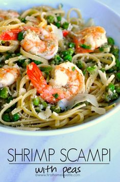 shrimp scampp with peas and pasta in a white bowl on a blue table