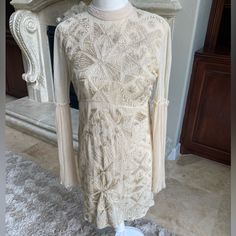 Free People Cleo Embroidered Bell Sleeve Boho Mini Dress Size 2 Beige Long Sleeve Embellished Dress, Long Sleeve Embellished Beige Dresses, Embroidered Lace Mini Dress With Long Sleeves, Long Sleeve Lace Mini Dress With Embroidery, Cream Embellished Long Sleeve Dress, Bohemian Fitted Long Sleeve Lace Dress, Fitted Long Sleeve Bohemian Lace Dress, Fitted Bohemian Long Sleeve Lace Dress, Boho Mini Dress