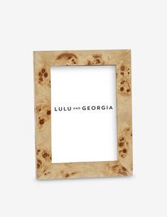 a wooden frame with the words lulu and georgia on it