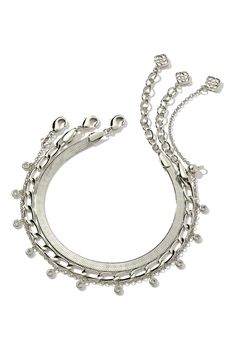 The Kassie Set of 3 Chain Bracelet in Silver features three classic chain links. Complete with a herringbone, paperclip, and crystal charm chain, wear altogether or curate your own bracelet stack. Bracelet In Silver, Brass Bangle, Charm Chain, Chain Bracelets, Chain Links, Silver Chain Bracelet, Crystal Charm, Gold Fashion, Bracelet Stack