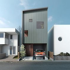 a car is parked in front of a two story house