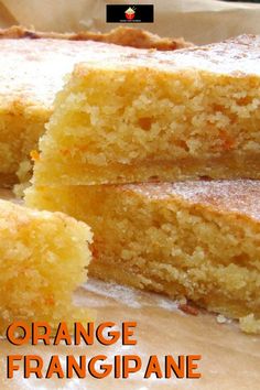 orange frangipane cake is cut in half and stacked on top of each other