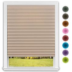 a window with some different colored blinds in front of it