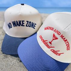 Make a splash with our No Wake Zone Classic Trucker Hat in White/Royal! Perfect for keeping the sun out of your eyes whether you're at the lake, ocean, or poolside. Versatile enough to wear anywhere, this hat adds a touch of fun to any outfit. Dive in and grab yours today! Yacht Party Aesthetic, Trucker Hat Designs, Preppy Wishlist, No Wake Zone, Summertime Vibes, Beach Ware, Classic Martini, Bachelorette Party Planning, Floral Doodle