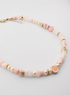 This necklace is versatile and suitable for casual gatherings. It adds a touch of refined femininity to any outfit, making it an ideal accessory to elevate your style. Every Piece is Unique . They are made by hand in Florida Pink Beaded Chain Necklace, Bohemian Pearl Necklaces With Adjustable Chain, Bohemian Pearl Necklace With Adjustable Chain, Trendy Pink Round Necklace, Trendy Round Pink Necklaces, Trendy Pink Round Necklaces, Chic Beaded Chain Necklaces For Gifts, Handmade Choker Necklace For Everyday, Chic Handmade Necklace For Gifts