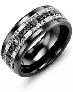 a black and white wedding ring with two rows of diamonds on the inside of it