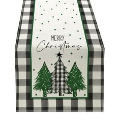 a christmas table runner with trees on it