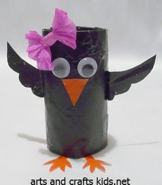 an owl made out of toilet paper sitting on top of a white surface with the words arts and crafts kids net