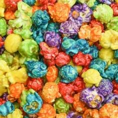 many different colored candies are scattered together