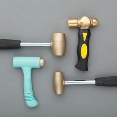 various tools are laid out on a gray surface