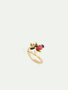 This high-end costume jewelry ring showcases a magnificent bird with a red body. This little animal comes with a brown crystal and green leaves, all delicately adorning a gold-plated band. La Maison Les Néréides unveils the Winter Velvet collection to celebrate snowdrops and hellebores, the last flowers of the season. A bullfinch twirls here and there in this collection with particularly intricate settings. Adjustable Ring: Gilded and hand-enameled brass, bead and faceted glass Length: 1.9cm Wid Paris Souvenirs, Les Nereides, Jewellery Ring, Bullfinch, Costume Jewelry Rings, Velvet Collection, Language Of Flowers, Boutique Homes, New Paris