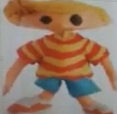 an image of a doll wearing a hat and shorts