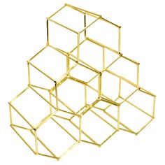 four golden cubes stacked on top of each other in order to form an object