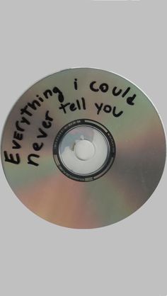 a cd with writing on it that says everything i could do is fall you down