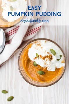 pumpkin pudding in a glass bowl with whipped cream and pumpkin seeds on the side, next to a spoon