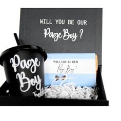 an ice cream box with two cups and a sign that says will you be our page boy?