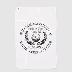 a white golf towel with the words, william matheron hole in one 13th hole written on it