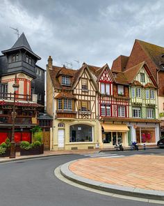 several buildings line the street in front of each other