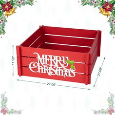 a red wooden crate with merry christmas lettering on the side and holly decorations around it