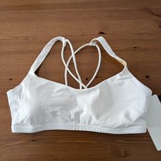 A Super Cute Free To Be Bra From Lululemon. New With Tags. Size: 10. Free To Be Bra, Lululemon Bras, Gym Fits, Sports Bras, Women's Intimates, Lululemon Athletica, Sports Bra, Color White, Super Cute