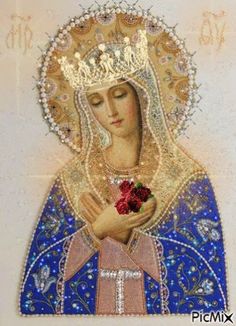 an image of the virgin mary with roses in her hands