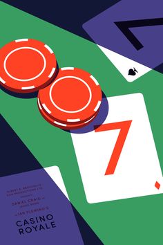 two red poker chips sitting next to each other on top of a green and purple table