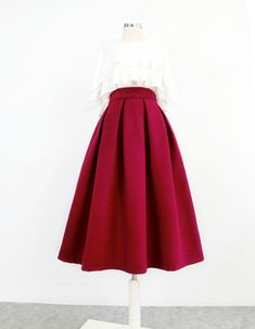 Solid Color Full Ruffled Skirt, Fall A-line Party Skirt, High Waist Ruffled Skirt For Fall, Winter Party Pencil Skirt With Lining, Winter Party Pleated Skirt, Winter Midi Pencil Skirt For Party, Elegant Winter Ruffled Skirt, Winter Voluminous Flared Skirt, Winter Voluminous Lined Skirt