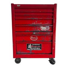 an old red tool box on wheels with stickers and decals, isolated against a white background