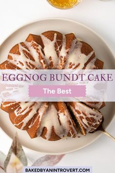 eggnog bundt cake on a white plate with the words eggnog bundt cake above it