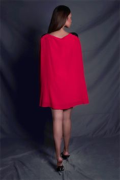 Bittersweet dress in crepe base with cape detailing and abstract pattern on sleeve.
Components: 1
Neckline: Round
Sleeve Type: Cape sleeves
Fabric: Crepe
Color: Red
Other Details: 
Cape detailing
Abstract pattern

Occasion: Party - Aza Fashions Red Cape Sleeve Dress For Evening, Red Party Dress With Cape Sleeves, Red Cape Evening Dress, Party Dresses With Draped Kimono Sleeves, Red Cape Dress For Party, Red Dress With Kimono Sleeves For Party, Red Cape, Cape Sleeves, Cape Dress