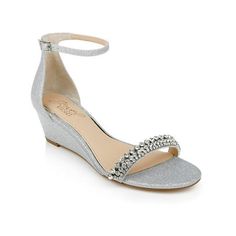 a women's silver wedged sandal with crystal embellishment