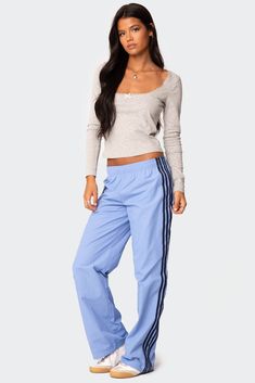 Nikki Nylon Pants – edikted Sporty Striped Pants For Loungewear, Athleisure Bottoms With Contrast Stripes, Sporty Straight Leg Bottoms With Contrast Stripes, Sporty Straight Leg Bottoms With Side Stripes, Sporty Striped Pants With Side Stripes, Athleisure Straight Leg Bottoms With Side Stripes, Stretch Bottoms With Three Stripes For Streetwear, Striped Stretch Athleisure Bottoms, Striped Athleisure Bottoms For Spring