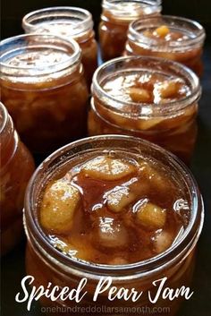 jars filled with food sitting on top of a table