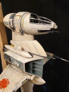 a star wars action figure is on display