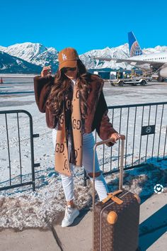 AIRPORT OUTFIT | Travel Fashion Look | Emily Ann Gemma, The Sweetest Thing Blog. LiKEtoKNOWit Outifts. LOS ANGELES DODGERS CARHARTT X '47 CLEAN UP, Gucci GG jacquard wool silk scarf, Big Time Faux Fur Jacket, Oversize Low Top Sneaker ALEXANDER MCQUEEN, FREE PEOPLE Tunic T-shirt, Panarea 60mm Aviator Sunglasses. Emily Ann Gemma, The Sweetest Thing Blog #EmilyGemma #theSweetestThingBlog Gucci Scarf Outfit, Wool Scarf Outfit, Chic Travel Outfit, Airport Outfit Ideas, Travel Outfit Ideas, Travel Chic