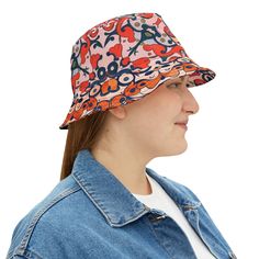 First, it protected fishermen from rain in the 1900s. Now, the bucket hat is making its comeback. Make it a part of your wardrobe! Check out our other apparel and home items that match this print - https://btdubsdesigns.etsy.com and https://btdubshome.etsy.com Here are the deets for our BTDubs bucket hats:  - Material: 100% polyester - Available in 2 sizes - Sewn-in label - Made in USA Retro Bucket Hat With Curved Brim For Festivals, Retro Curved Brim Bucket Hat For Festivals, Retro Festival Bucket Hat With Curved Brim, Retro Bucket Hat For Festival, Retro Adjustable Bucket Hat With Wide Brim, Retro Wide Brim Adjustable Bucket Hat, Retro Adjustable Wide Brim Bucket Hat, Spring Fishing Bucket Hat, Spring Bucket Hat For Fishing