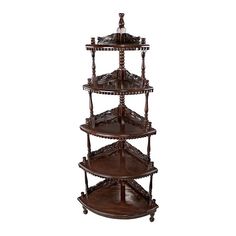 three tiered wooden shelf with carved designs on the top and bottom, in red wood