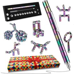 an assortment of colorful items including a pen, necklaces and earrings