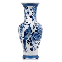 a blue and white vase with birds on it