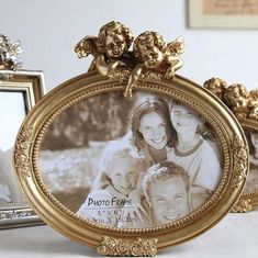 an ornate gold frame with three photos in it