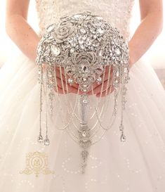 a close up of a person wearing a wedding dress and holding a bridal belt