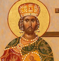 a painting of jesus with an ornate crown and cross on his chest, in gold paint