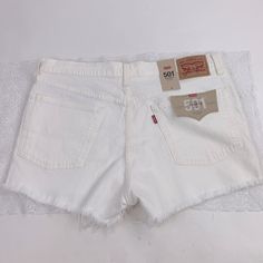 Levi’s 501 Mid Rise Shorts White / Off White Distressed With Raw Hem Size 31 With Stretch Button Fly Brand New Nwt Please See Pictures For Details & Measurements As They Are Part Of The Description. Thanks For Looking! . Bundle Other Items & Save On Shipping! M7 Flyp Vintage White Jean Shorts For Spring, Vintage High Waist White Shorts, Levi's White Cotton Bottoms, White Levi's Cotton Bottoms, White Cotton Levi's Bottoms, Vintage White Jean Shorts, Vintage White Cotton Jean Shorts, White Cotton Vintage Jean Shorts, Vintage White Bottoms For Summer