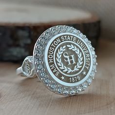 You can send all your questions about my store and products via message. In this description, all the details of the product are explained to you. *The logo of any university you want can be made. * Ring Face: Round *We can use the stone colors you want in the ring. *I can make our rings in 10K, 14K, 18K and 22K gold. *The ring is 925 Sterling Silver. *We can change the color of the stone in the ring. All colors are available. *The ring has My Brand and 925K stamps on it. *Before the rings are p Coat Of Arms Logo, High School Rings, Class Rings College, College Ring, Graduation Ring, School Rings, College Rings, College Class, Family Ring