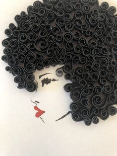 a drawing of a woman's face made out of black spirals on white paper